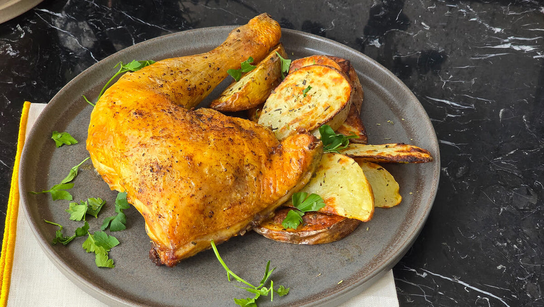 Muslos de pollo asados con patatas gajo en freidora de aire